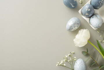 Easter aesthetic concept: Overhead view of rich greyish eggs in a special ceramic container,...