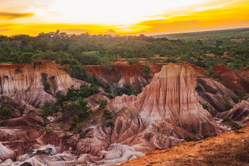 Scenic view of rock formations at Marafa Depression - Hell's Kitchen at sunset in Malindi, Kilifi...