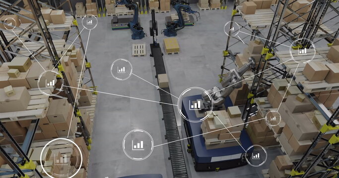 Image of network of conncetions with icons over robotic arms with boxes warehouse