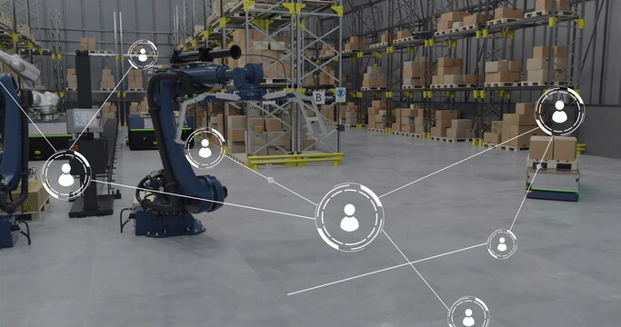 Image of network of conncetions with icons over robotic arms and boxes in warehouse