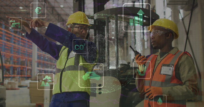Image of eco icons and data processing over diverse people working in warehouse - Powered by Adobe