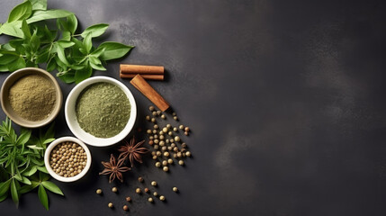 Various herbs, spices and vegetables on grey stone background, top view with copy space