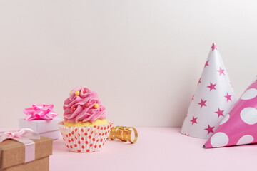 Colorful celebration background with various party decoration and cupcake. Minimal party concept.