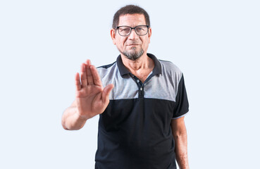 Elderly man rejecting with the palm of hand isolated. Serius old man gesturing stop with palm of...