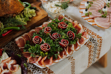 Cossack table. Banquet hall Meat treats for guests. Homemade cutouts. Pork tenderloin. Delicious meat cuts. Meat plate. Delicious compositions from smoked mint. Cottage cheese.