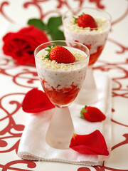 Strawberries with yogurt and roses.
