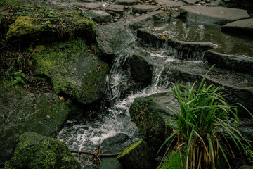 Fototapeta premium High anfle view of stream against rocks 