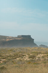 Praia do Norte with the fort of San Miguel in the background, Nazare.