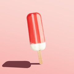 Red ice cream popsicle on bright background. Minimal summer concept.