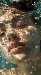 Submerged serenity, woman's face in water bathed in golden sunlight reflections