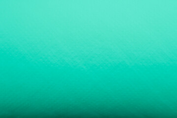 Light gradient paper backdrop, trendy turquoise color. Textures formed by cardboard or paper ancient of color.