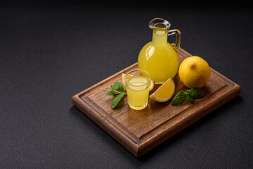 Alcoholic drink yellow limoncello in a small glass