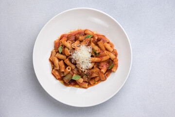 Rigatoni pasta with tomato sauce and parmesan cheese