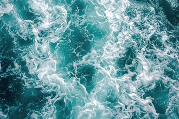Naklejka premium Turquoise ocean waves in aerial view.