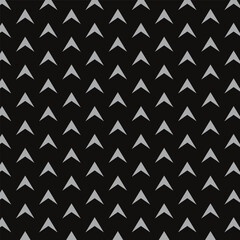 abstract seamless repeatable grey up arrow pattern on black.
