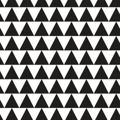 abstract seamless repeatable black triangle pattern.