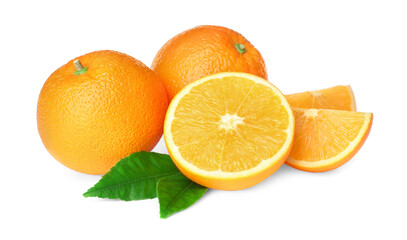 Cut and whole fresh ripe oranges with green leaves on white background