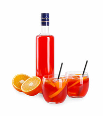 Aperol spritz cocktail, straws and orange slices in glasses isolated on white
