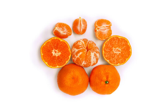 Fresh mandarin oranges on a white background with space for text. Top view, flat lay