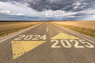 numbers 2025 go and start on asphalt road highway with sunrise or sunset sky background. concept of...