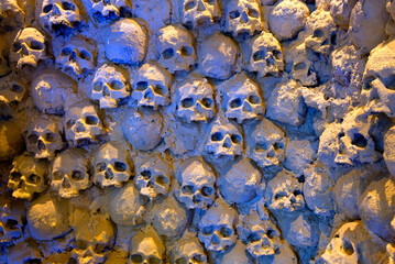 Wall of human skulls and bones