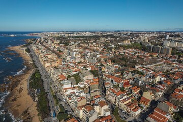 Horizons Collide: Majestic Aerial Dance of City and Ocean Unveiled in Foz Do Douro