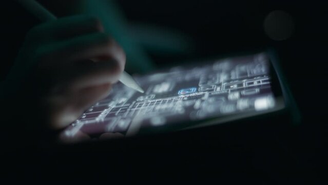 Architect using drafting software on a tablet to draw a house layout. Close up, slow motion.