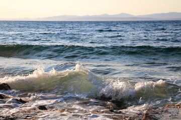 Bright blue sea and clear sky. Copy space.