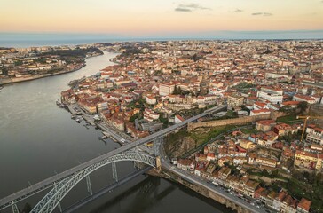 Elevated Majesty: A Breathtaking Vista of Portos Dom Luís I Bridge and Cityscape