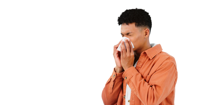 Man, sneezing for allergies and sick with tissue for runny nose isolated on png transparent background. Cold, flu or covid with bacteria virus, influenza and illness with toilet paper for sinus - Powered by Adobe