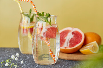 Vitaminized summer detox water. Refreshing summer cocktails with citrus fruits. Low alcohol, zero...