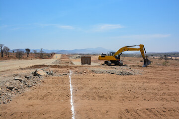 construction machines at works, dozer, roller machine, excavator, crawler rock drill machine,...