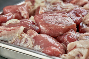 Fresh marinated pork kebab in a butcher shop