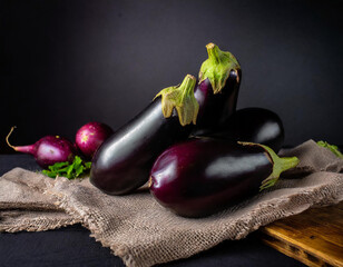 eggplant placed on eco fabric, product photography, food, restaurant, macro, black background