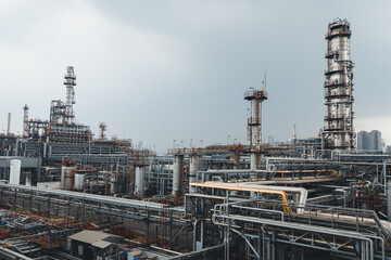 Fototapeta na wymiar Oil​ refinery​ and​ plant and tower column of Petrochemistry industry in oil