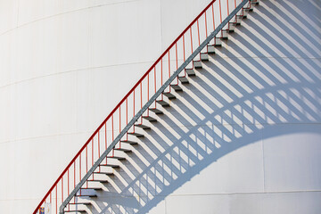 Spiral Staircase on Storage fuel Tank with sunlight