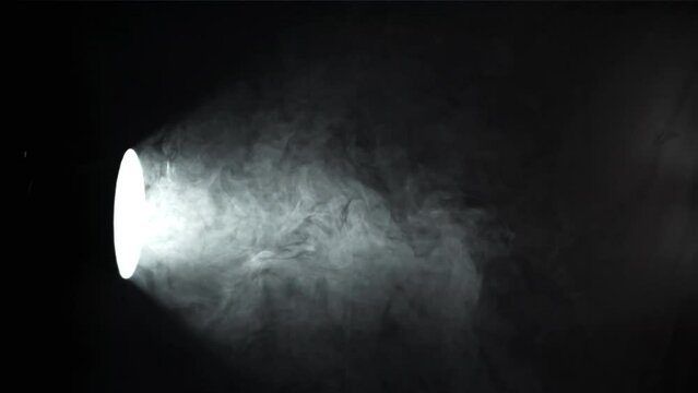 Smoke in studio with lighting projektor. Filmed on a high-speed camera at 1000 fps. High quality FullHD footage