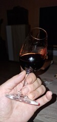 having glass of red wine