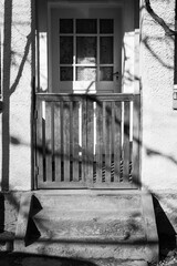 girl on the threshold of the house
