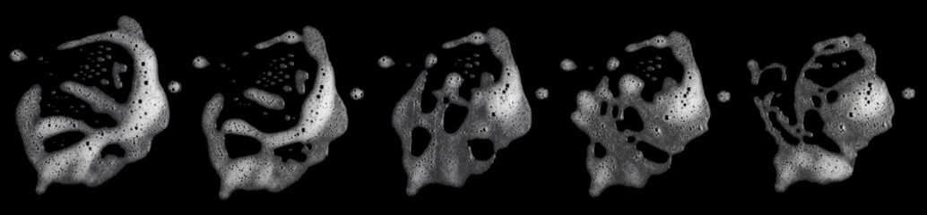 set top view of white foam soap, shampoo bubble isolated on a black background. concept of suds...