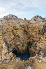 Rock formation of cliff at the atlantic coast line near Ponta da Piedade, Lagos, Algarve, Portugal.