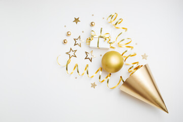 Birthday party festive background with golden decoration from carnival hat, gift box, balloons,...