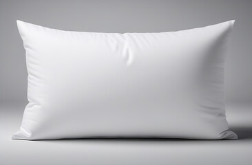 One white rectangular pillow separately on a gray background. Side view