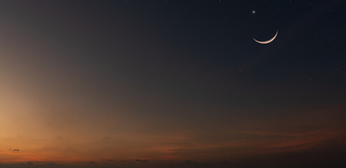 Crescent and stars on dusk sky twilight after sundown, end of day light, Religion of Islamic well...