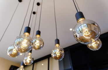 Electrical celing lamps decoration, design as shiny round bulbs in the modern room
