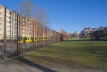 Fototapeta na wymiar Berlin, Germany - Jan 28, 2024: Bernauer Strasse. The Berlin Wall Memorial was built in 1998 to commemorate the division created by the wall and the deaths that occurred because of it. Selective focus