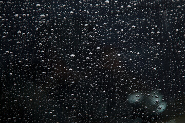 View of the rain drops on the car window