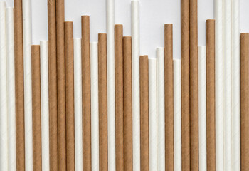 Closeup of texture of paper straws.Brown and white straws.Zero waste concept