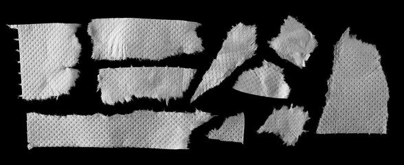 Set torn paper towels isolated on black