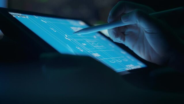 Architect drawing a house layout on a tablet. Close up, slow motion.